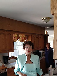 Older grandma is posing seminaked for money
