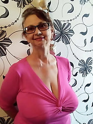 Chubby mature prostitute is taking off her underwear for cash