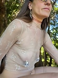 A sexy girl has long pussy and she is walking in the hills