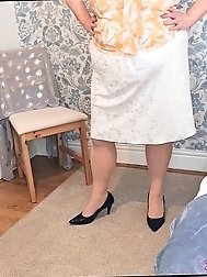 The sweet pussy lips of a mature tart are spread wide